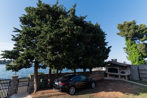 Studio, 1 Bedroom, Smoking, Garden View | Parking | Free self parking - Beachfront Studio-apartment Spazzio (Preko)