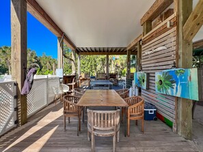 Outdoor dining - "FLORIDAYS" - Luxury Beach House w/ Heated Pool, Spa & Carts (North Captiva)