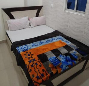 Blackout curtains, soundproofing, free WiFi, bed sheets