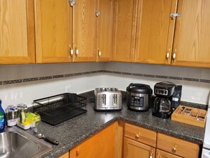 Fridge, microwave, coffee/tea maker, toaster