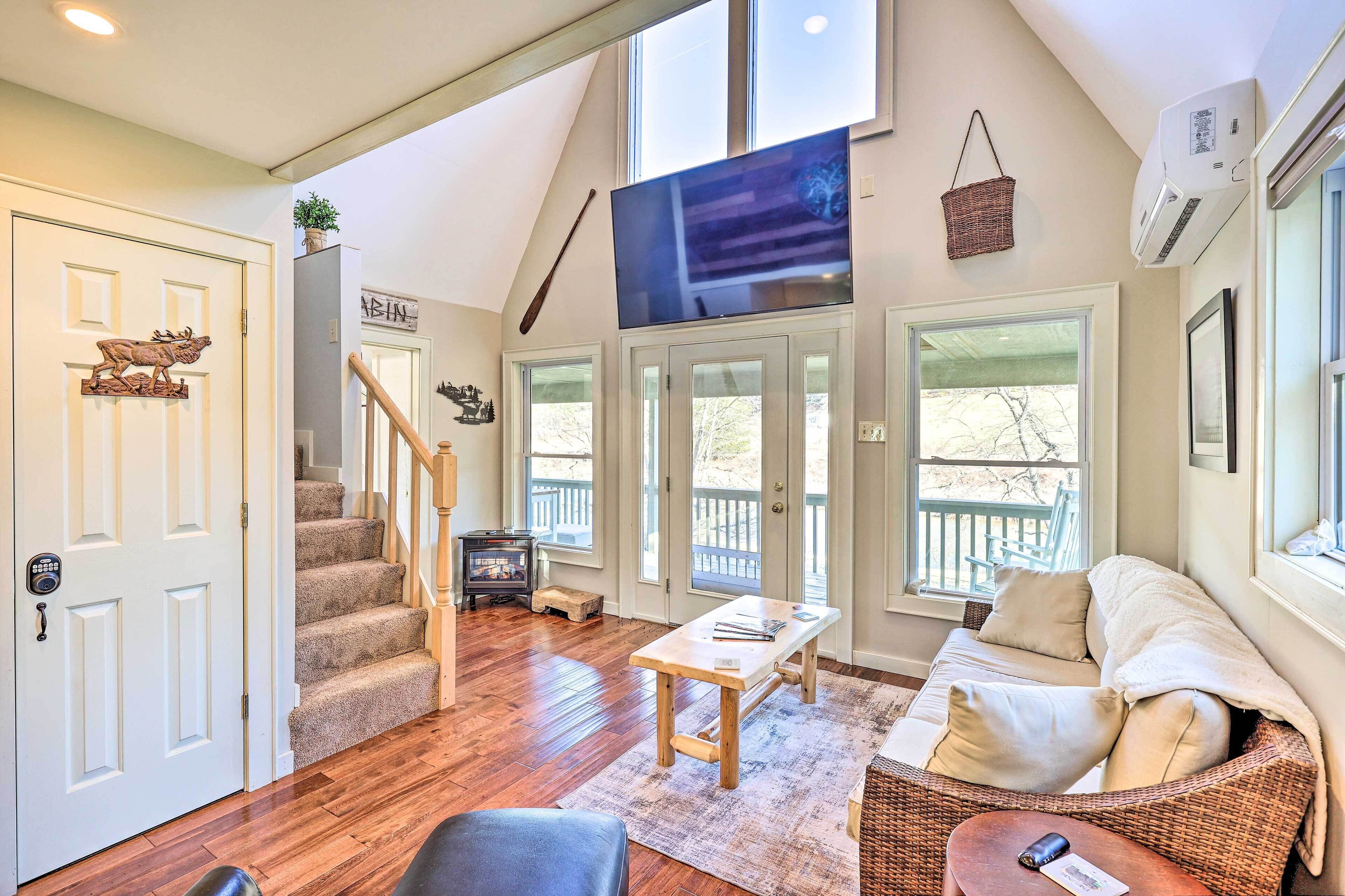 Charming Riverfront Cabin w/ Yard & Porch!