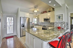 Fridge, microwave, stovetop, dishwasher - Sunny Florida Home w/ Decks & View, Steps to Beach (Flagler Beach)