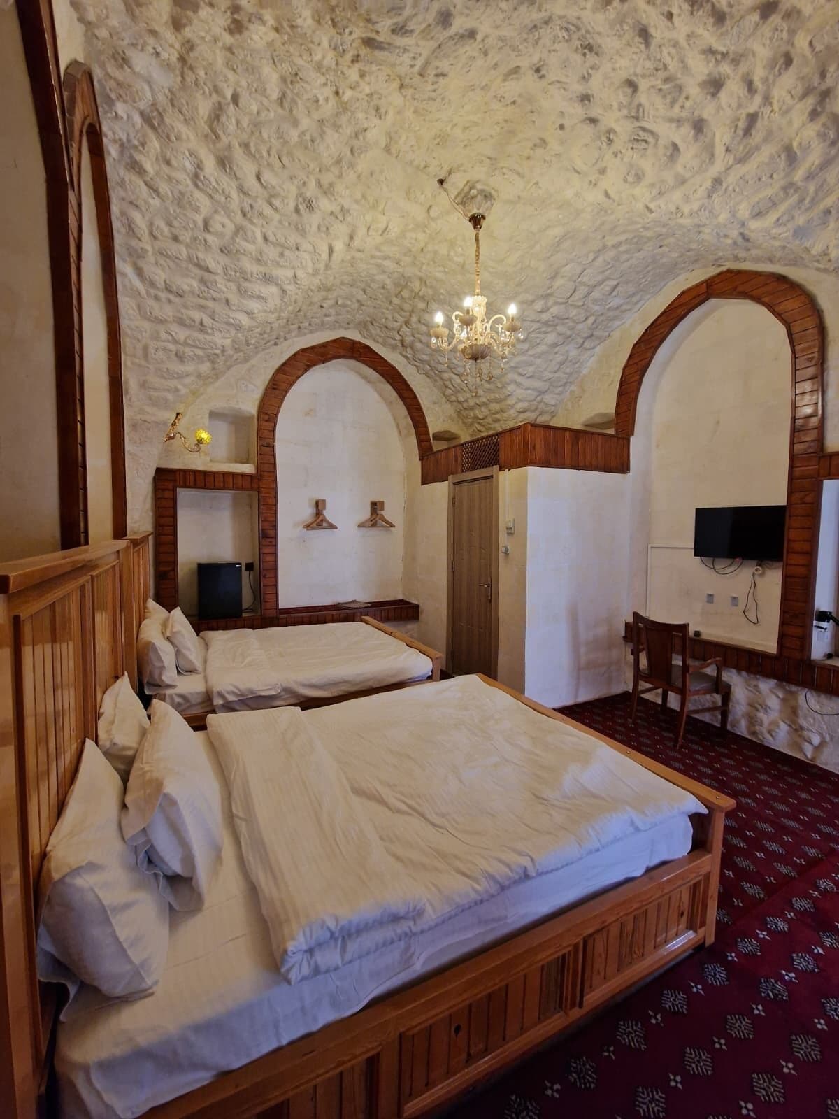 Family Quadruple Room, 2 Queen Beds, Non Smoking, Courtyard View | Bathroom | Shower, slippers, towels