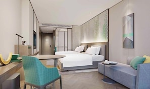 A modern hotel room with a bed, a desk, a chair, a sofa, and a wall-mounted artwork. - Holiday Inn Taiyuan City Center (Taiyuan)
