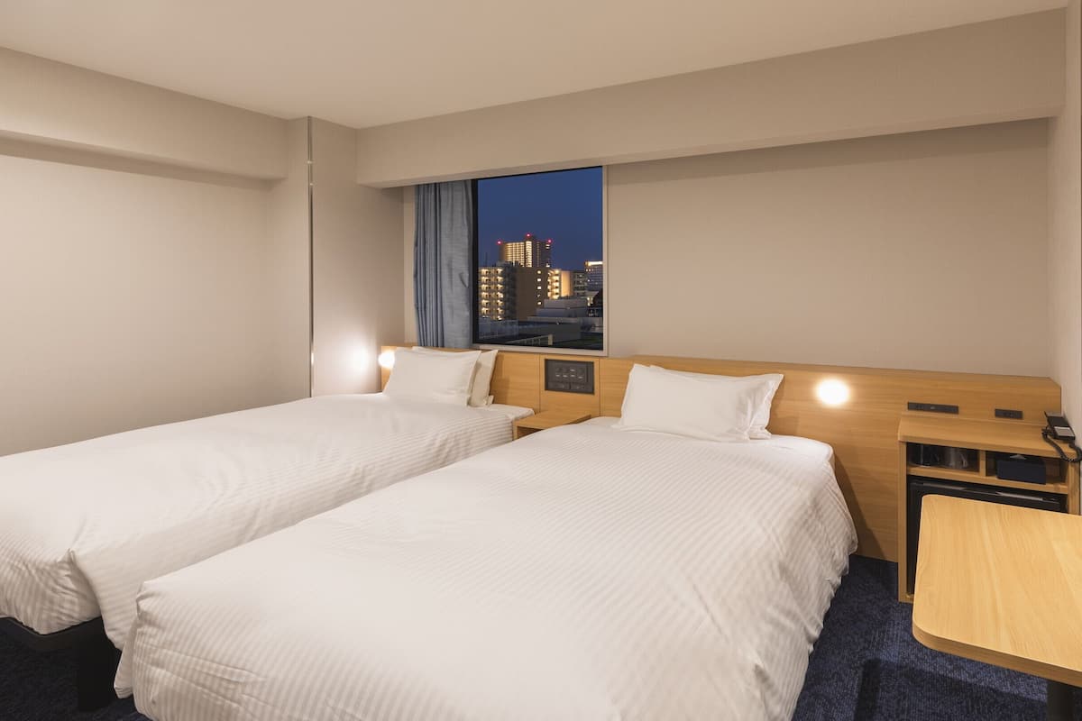 standard twin room, non smoking | 1 bedroom, down duvets, desk, blackout curtains