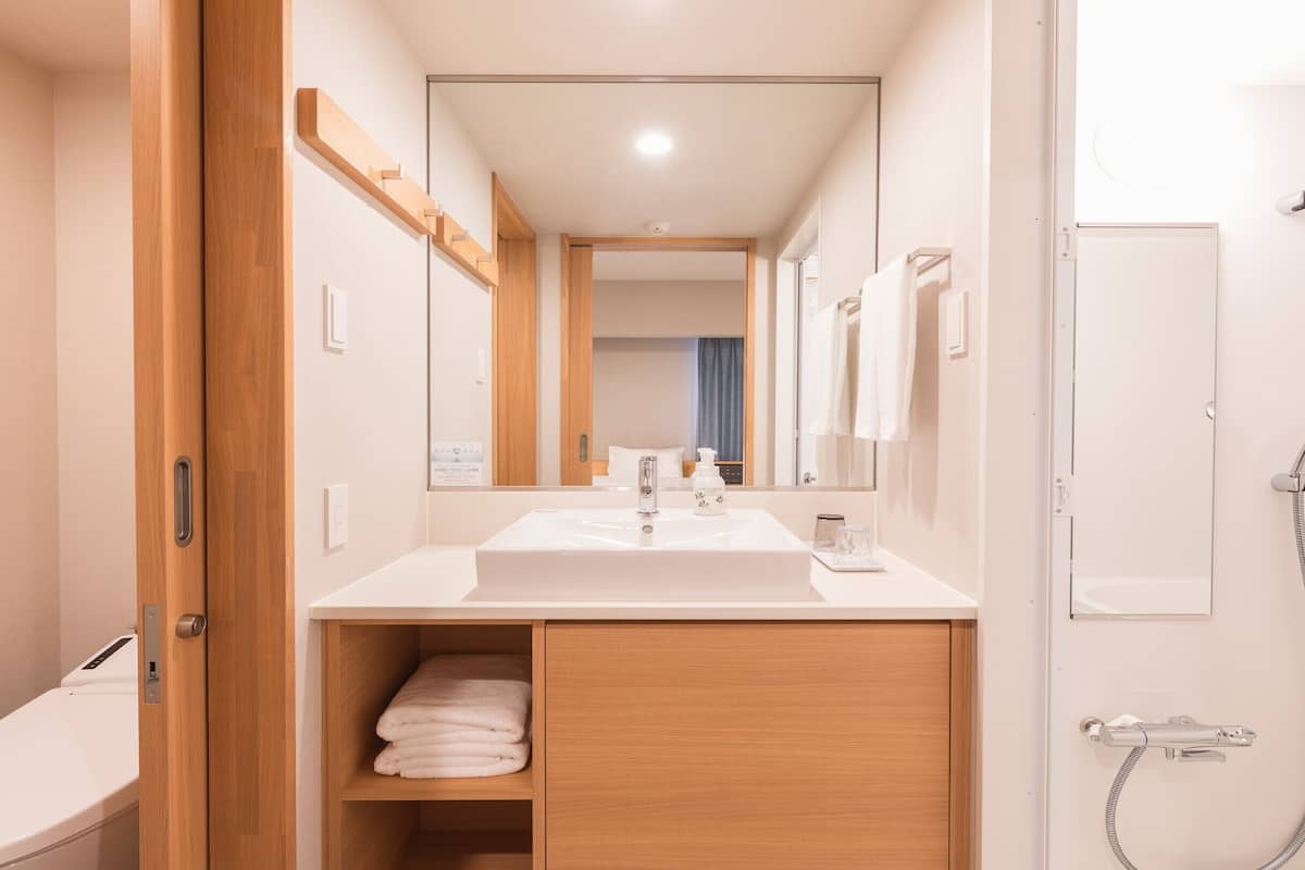 superior twin room, non smoking | 1 bedroom, down duvets, desk, blackout curtains