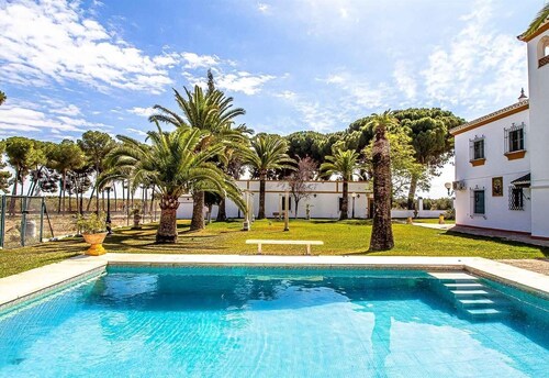 Holiday Home "Hacienda El Corchuelo en Marchena" with Pool, Garden & Wi-Fi