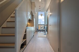 City Studio | Premium bedding, desk, laptop workspace, blackout drapes