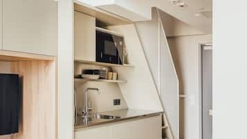 City Studio | Premium bedding, desk, laptop workspace, blackout drapes