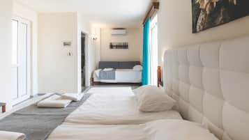 Chambre Triple Supérieure | Literie de qualité supérieure, coffres-forts dans les chambres