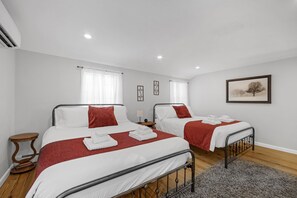 4 bedrooms, desk, iron/ironing board, travel cot