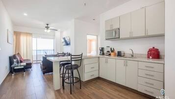 Fridge, microwave, stovetop, coffee/tea maker