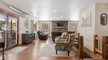 Smart TV, fireplace, foosball, books