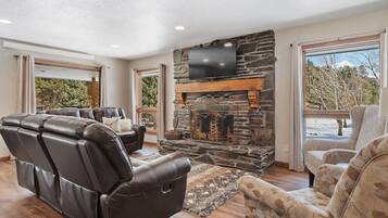 Smart TV, fireplace, foosball, books