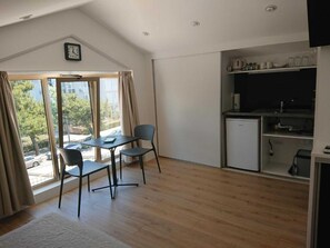 Studio (Studio Apartment - A2) | Private kitchenette | Fridge