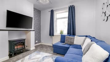 Casa | Área de sala de estar | Smart TV de 50 pulgadas con canales digitales, televisión y Netflix