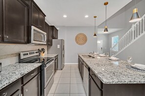 House (Multiple Bedrooms) | Private kitchen | Microwave, oven, stovetop, dishwasher