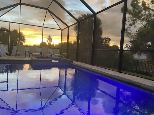 Tropical Oasis with saltwater pool & hot tub on a canal 8 miles from beaches