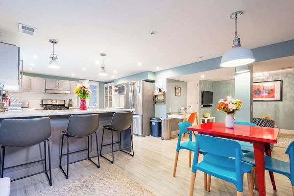 Modern kitchen with gas range. Large, open great room with modern kitchen, breakfast bar and plenty of room to cook.
