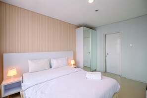 Room | 3 bedrooms, free WiFi, bed sheets - Elegant 3BR + 1 Apartment with Private Lift & 80 mbps internet at The Lavande Residence (Jakarta)
