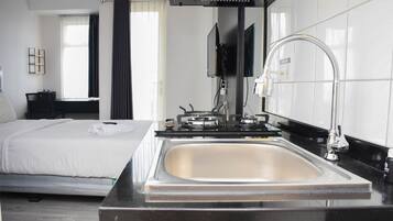 Room | Private kitchen | Fridge, stovetop, cookware/dishes/utensils