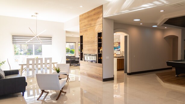 A spacious living area with a modern kitchen, a dining area, and a pool table. - Spectacular custom home with private pool (Las Vegas)
