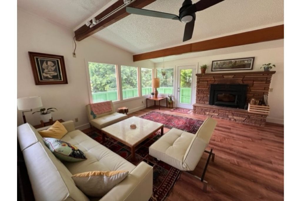 Private mid-century modern hideaway in forest near the river and sea.