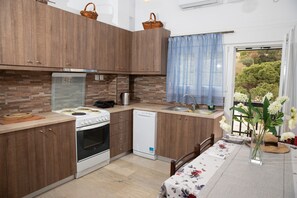 Fridge, microwave, oven, stovetop - White Heaven. Near the Marina Lakki and a Wonderful View of the Port. (Leros)