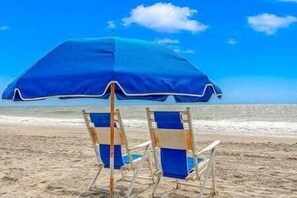 On the beach, beach towels