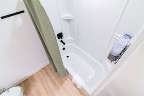 Combined shower/bathtub, hair dryer, towels - Mountain Home Theme: Suites of Lava #4 (Lava Hot Springs)