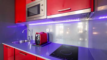Fridge, microwave, stovetop, coffee/tea maker