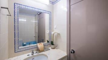Shower, hair dryer, soap, shampoo