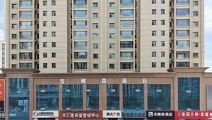 A multi-story building with a row of windows on each floor.