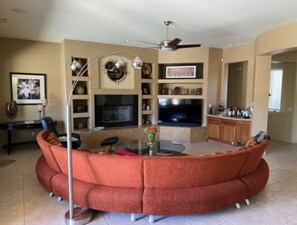 Smart TV, fireplace, DVD player, books