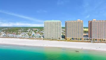 On the beach, sun-loungers, beach towels