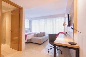 Minibar, blackout curtains, bed sheets