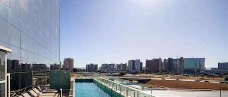 Seasonal outdoor pool, pool loungers