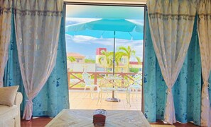 Deluxe Villa | Living area | LCD TV - palmvilla ishigakijima karei (Ishigaki)