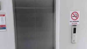A closed elevator door with a digital display showing the number 3. - 2-Bedroom Condo w/ Unli Wifi, Netflix, Prime Video, Apple TV, Game Console, Pool (Imus)