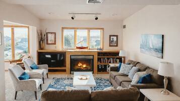 Smart TV, fireplace, DVD player, books