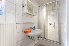 Shower, free toiletries, hair dryer, towels