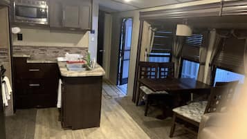 Comfort Mobile Home (Next To The River - RV Masoods Lodge) | Individually decorated, iron/ironing board, free WiFi, bed sheets