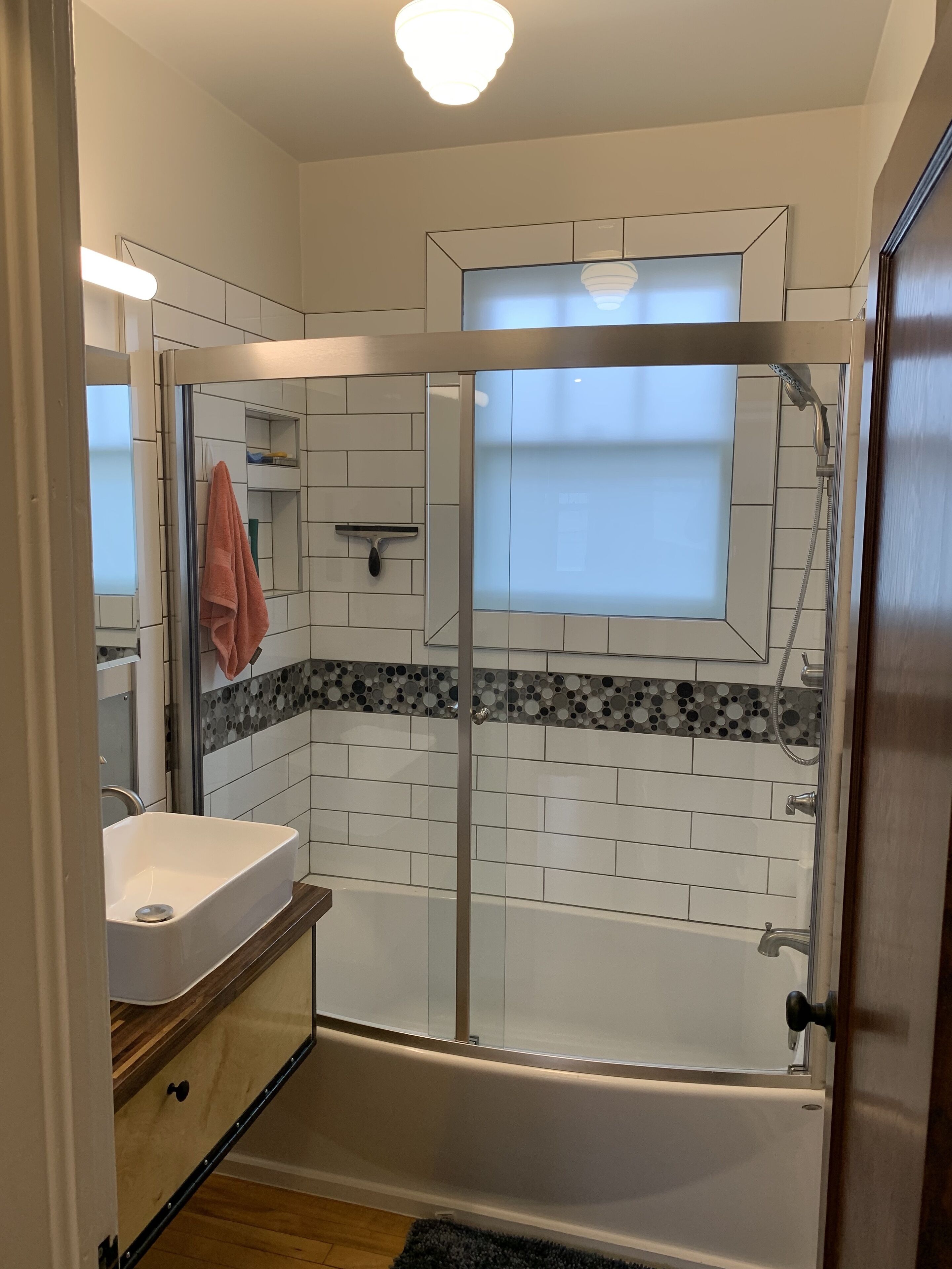 Combined shower/tub, hair dryer, towels, soap