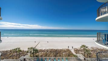 On the beach, sun loungers, beach towels