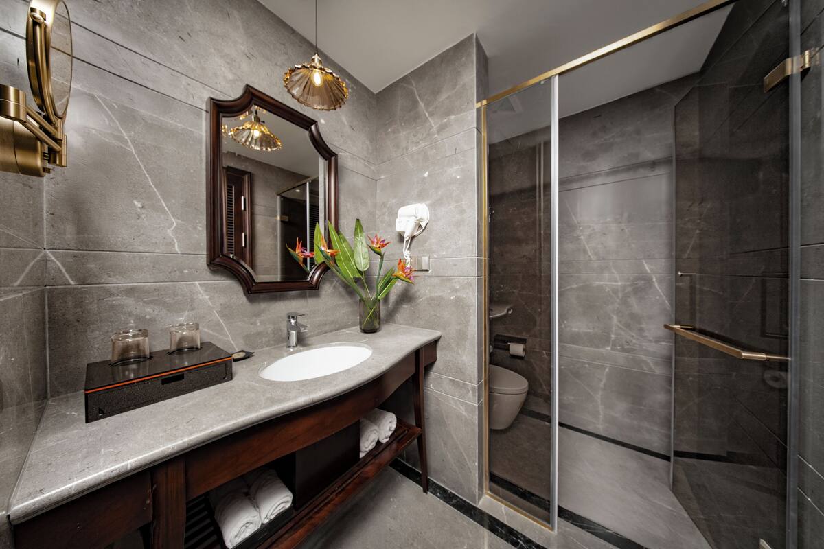 family connecting room with balcony | bathroom | shower, rainfall showerhead, free toiletries, hair dryer