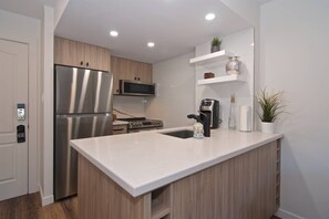 Fridge, microwave, oven, stovetop - Newly renovated Quality 1 bedroom at the Marquise- heated pool, located on Free ski/village shuttle (Whistler)