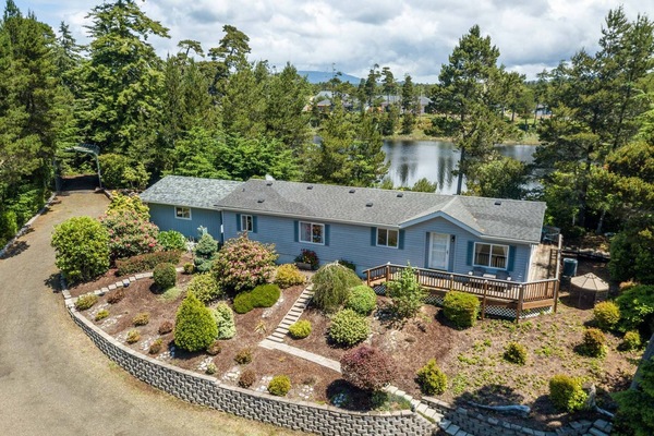 Wider View of Home, Driveway, View of Lake in back