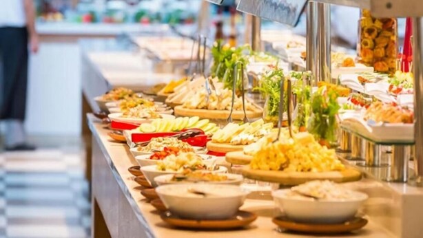A buffet with various food items and utensils. - Akalia Resort Hotel (Manavgat)