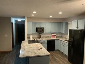 Microwave, stovetop, dishwasher, coffee/tea maker
