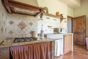 Fridge, stovetop, coffee/tea maker, cookware/dishes/utensils